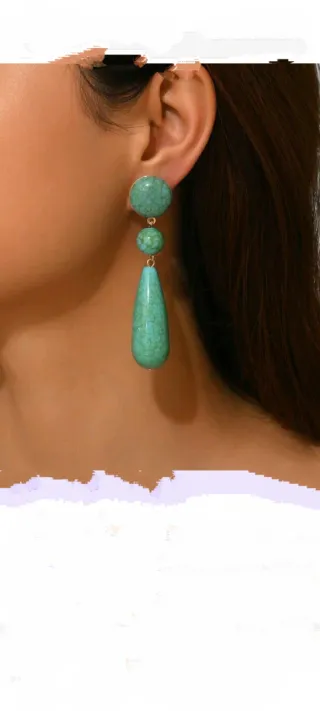 Pendientes largos dorados con turquesa