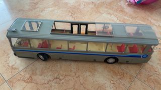 Autobús de  rico juguete antiguo asientos rojos