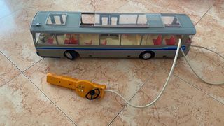 Autobús de  rico juguete antiguo asientos rojos