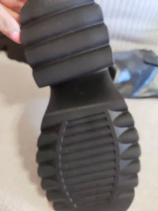 Stivali alti neri con dettagli argentati