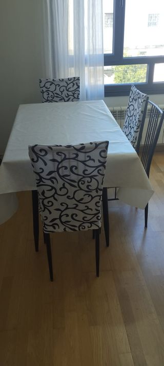 Mesa cristal y 4 sillas en PONFERRADA