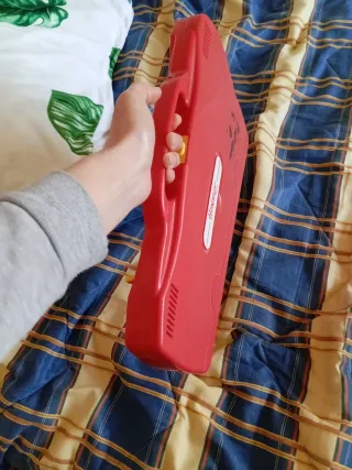 Xilófono portátil rojo