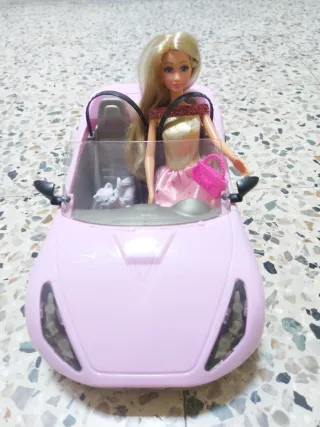 Coche rosa y muñeca Barbie