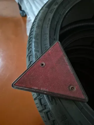 Triángulo reflectante catadióptrico