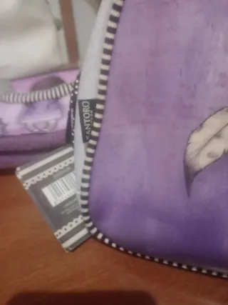 Dos neceseres Gorjuss Morado y Azul
