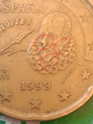 20 cts España 1999 con 3 exceso de metal en cara.