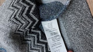 Traje de punto azul y gris nadine milano