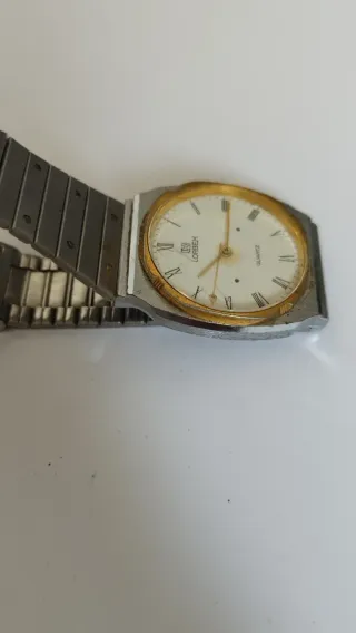 Reloj Lorbex de cuarzo, no funciona para reparar