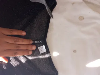 Blusa negra manga transparente