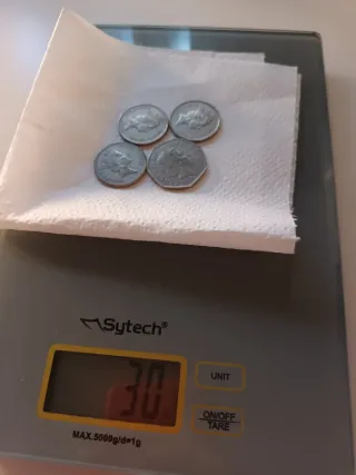 3 Monedas 10 Peniques y 1 de 50 Peniques