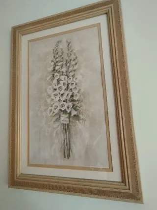 2 cuadros de flores enmarcados con cristal