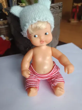 Muñeca Barriguitas y 4 conjuntos