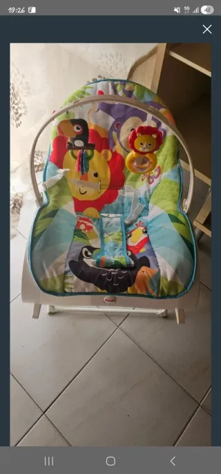 Silla balancín infantil con juguetes