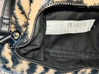 Bolso peludo Stradivarius estampado cebra