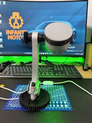 Lámpara de pistón de metal y plástico