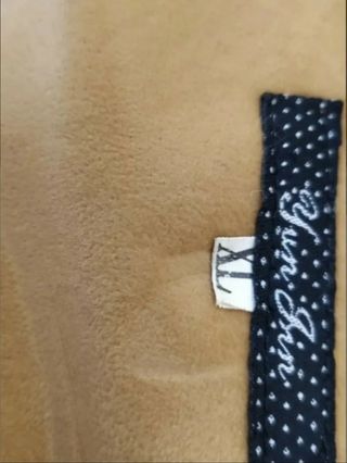 Cappotto montone con pelliccia sintetica