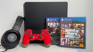 PS4 + Mando Rojo + Cascos Razer + GTA V y BO3