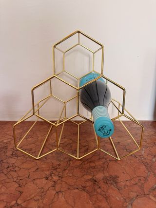 Botellero de vino dorado diseño geométrico