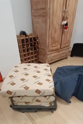 Sofá 3 plazas + puf cama azul