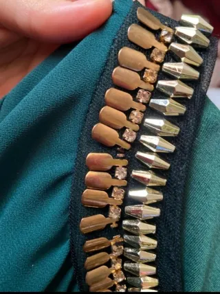 Blusón verde botella con pedrería