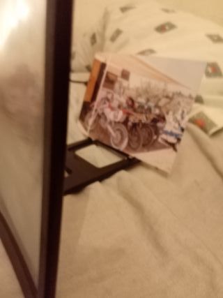 Adaptador lupa para móvil en su caja.