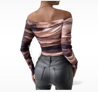 Top manga larga hombros descubiertos