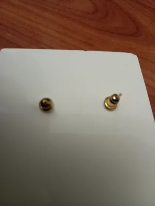 Dos pares de Pendientes dorados