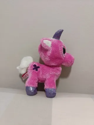 Peluche con ojos purpurina