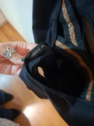 Traje de baño Oysho negro con abertura