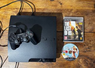 Console PS3 Slim Nera + Controller + 2 Giochi
