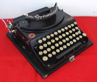 Máquina de escribir REMINGTON portable - c 1930