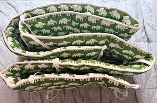 Pack protector cuna y sábanas elefantes