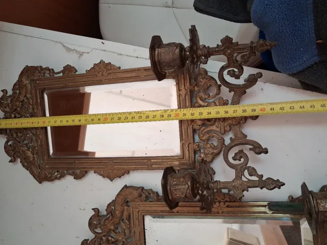 Apliques de bronce con espejo