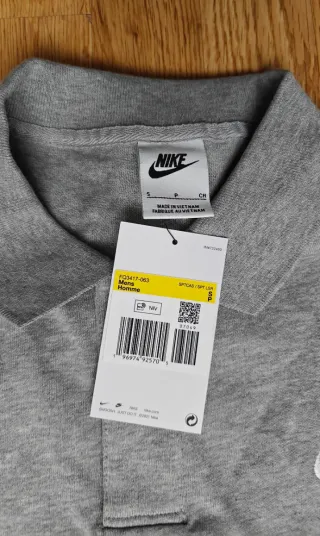 Polo Nike manga larga gris