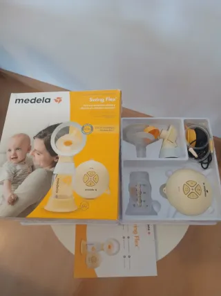 Sacaleches Medela Swing Flex  2 x 1 con su caja