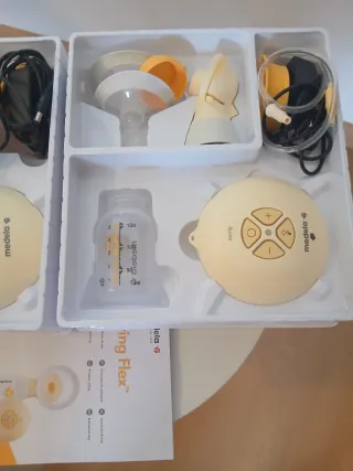 Sacaleches Medela Swing Flex  2 x 1 con su caja