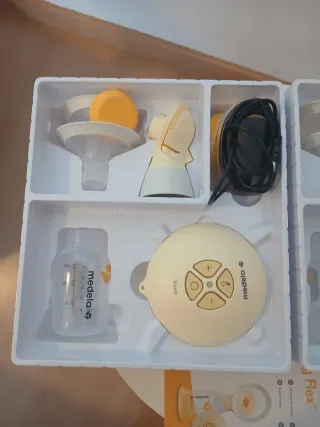 Sacaleches Medela Swing Flex  2 x 1 con su caja