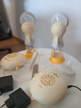 Sacaleches Medela Swing Flex  2 x 1 con su caja