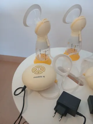 Sacaleches Medela Swing Flex  2 x 1 con su caja