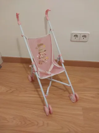 Cochecito de muñecas rosa