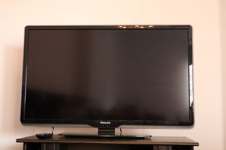 Mueble de TV y TV Philips