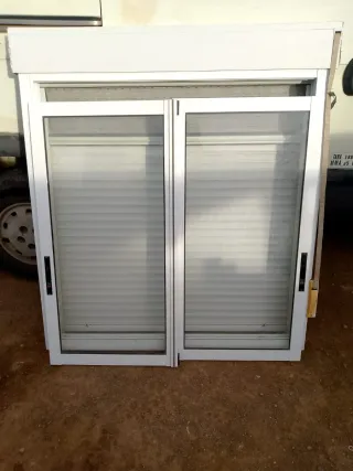Ventana corredera doble con mosquitera