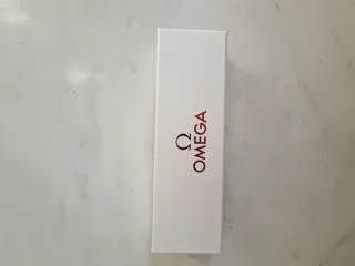 Penna Omega bianca dettagli oro rosa