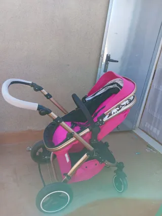 Carrito bebé 2en1 rosa y dorado
