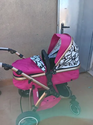 Carrito bebé 2en1 rosa y dorado