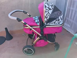 Carrito bebé 2en1 rosa y dorado
