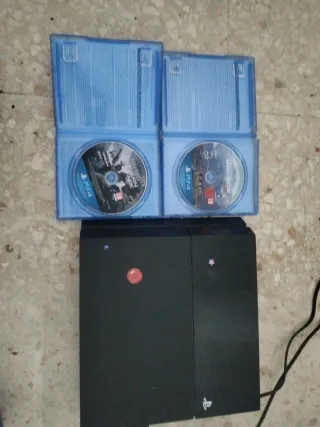 PS4 (PlayStation 4) Nera + 2 Giochi