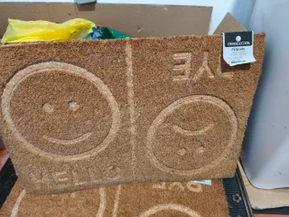 Tappeto d'ingresso Hello Bye con facce sorridenti/tristi