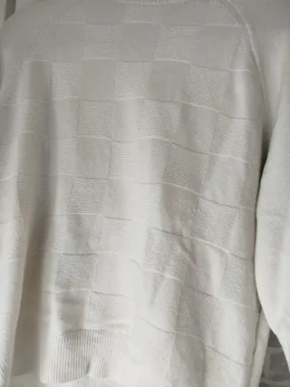 Suéter blanco de cuello alto