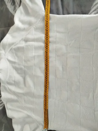 Suéter blanco de cuello alto